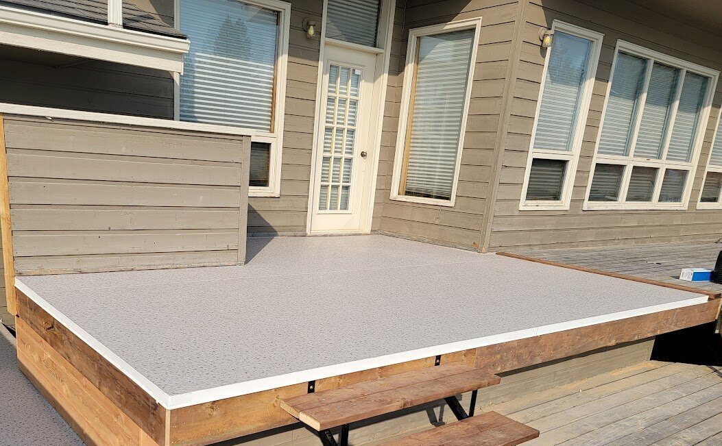 Freshly installed Duradek waterproof vinyl decking by Warwick Interiors, providing a clean, low-maintenance outdoor surface.