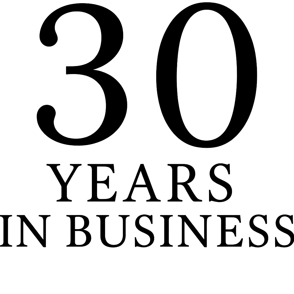 30 Years in Business” graphic celebrating Warwick Interiors’ longstanding presence in Invermere. 2025 Black