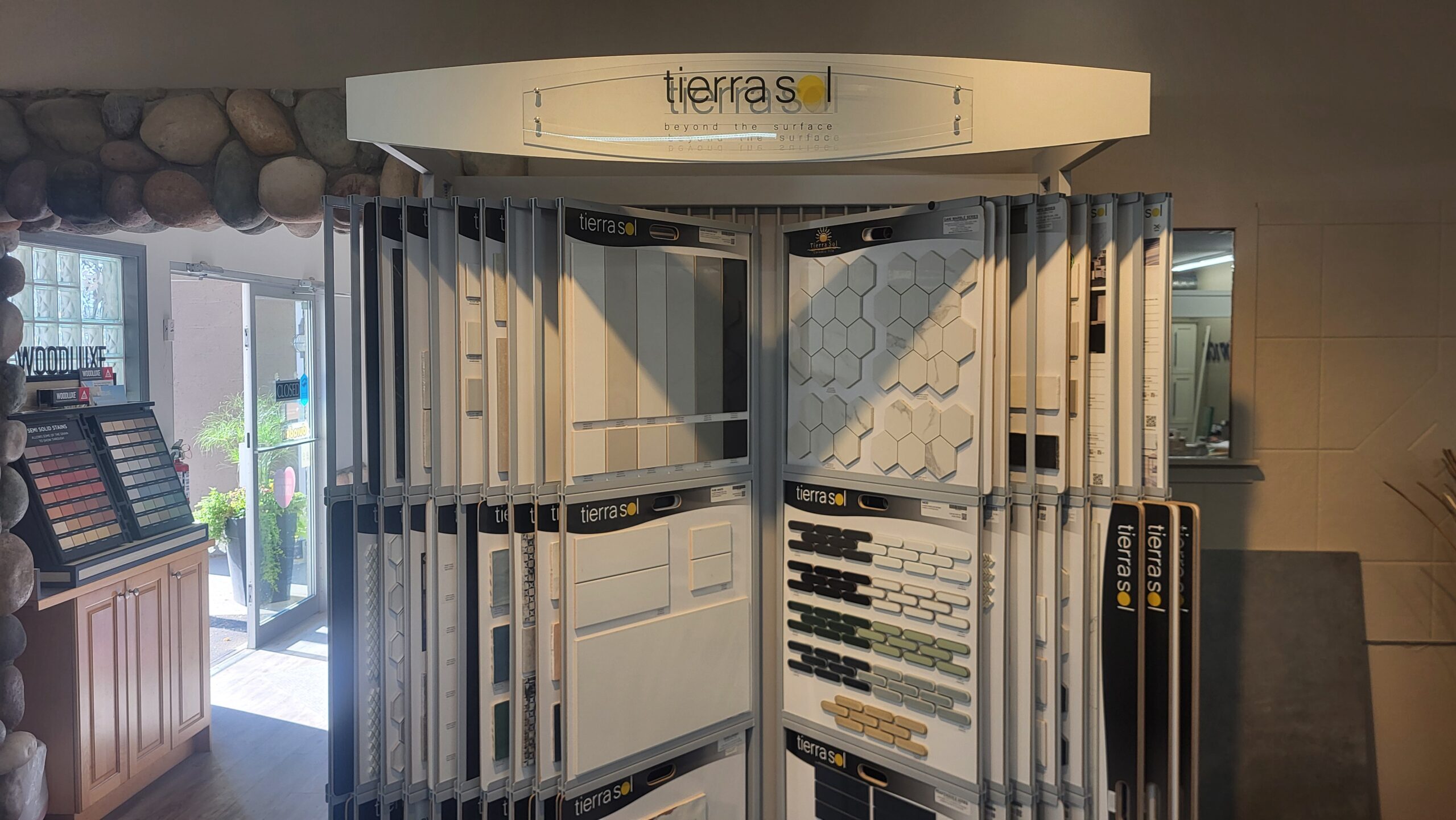 Tierra Sol tile and mosaic sample rack at the Warwick Interiors showroom in Invermere, BC.